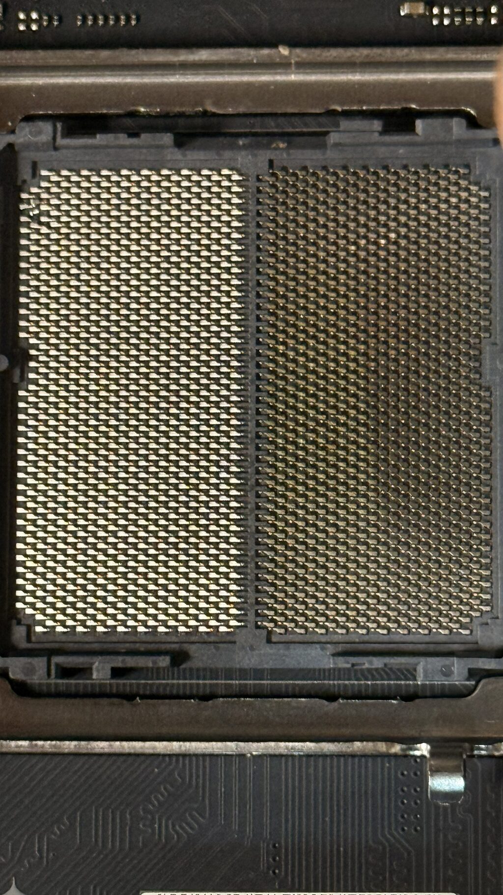 The bent CPU socket that caused the boot failure