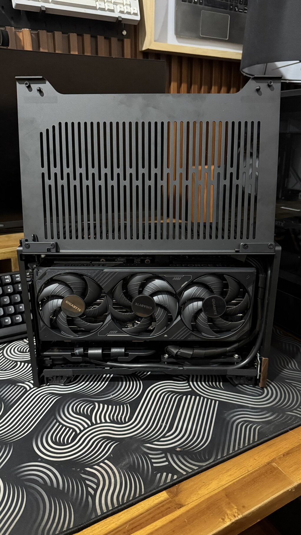 The triple-fan GPU installed with minimal clearance